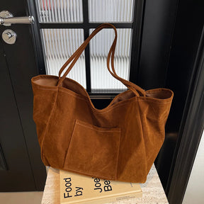 Bolsa de Camurça com bolsos Hobo