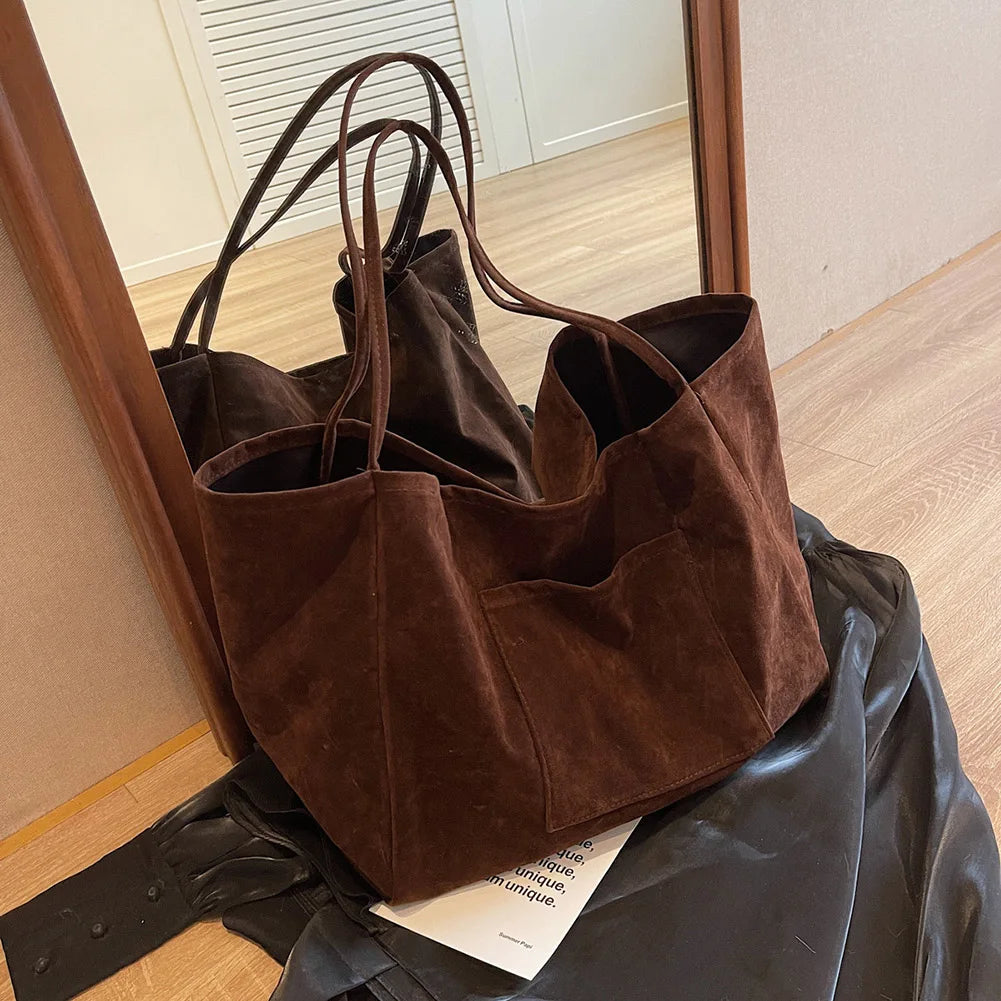 Bolsa de Camurça com bolsos Hobo